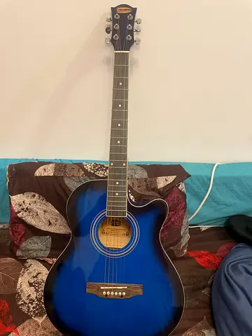 Blue cutaway acoustic- guitar - good condition