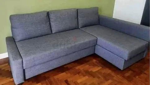 Light grey L-shaped sofa with chaise - good condition