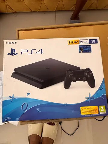 Sony PS4 Slim 1TB Console with DualShock 4 - Boxed 3 controllers with 2 games
