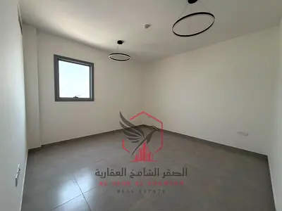 Brand-new 2BR in Al Majaz 2, second tenant, spacious layout, open sea view, 2 baths, built-in wardrobes, central AC & gas, free maintenance, 9 payment
