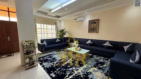 Villas in Al Muwaihat 1, with all electricity, water and air conditioning fees included, on the main street, ready to move in, with a special discount