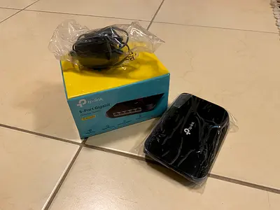TP-Link 5-Port Gigabit Ethernet Switch (like-new, with box and adapter)