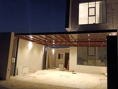 Modern wooden pergola carport with built-in lighting