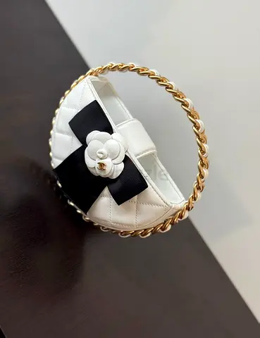 White lambskin Chanel round camellia cluch