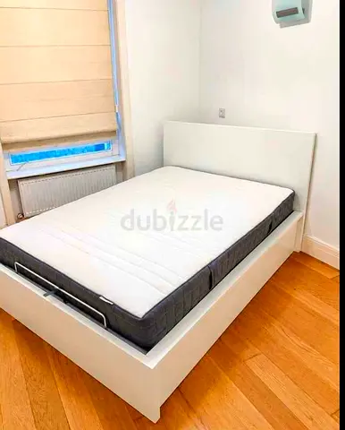 IKEA hydrolic bed with mattress queen size