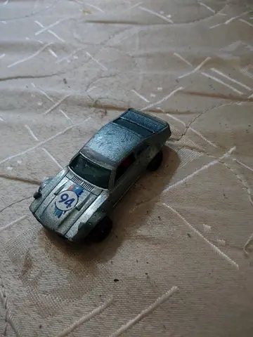 Used small die-cast toy rally car (silver, vintage look) Original hot wheel Ford