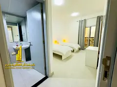 Luxurious two-bedroom apartment with a living room, fully furnished with brand new, high-end furnitu