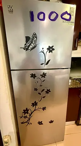 Silver double-door refrigerator, 2 years old with bill and warranty