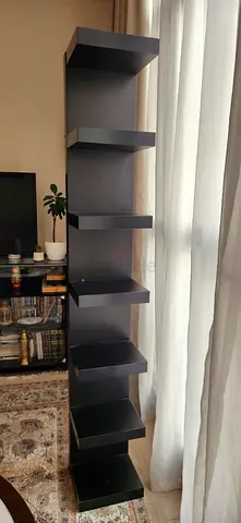 Tall black wall shelving unit — 6-tier display shelf