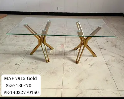 Glass Top Coffee Table with Gold Crossed Legs (130x70 cm) - Excellent Condition
