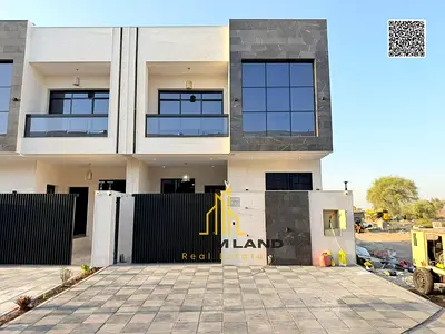 فيلا للبيع في عجمان. تصميم عصري بواجهة حجرية شاملة رسوم المكيفات والتسجيل