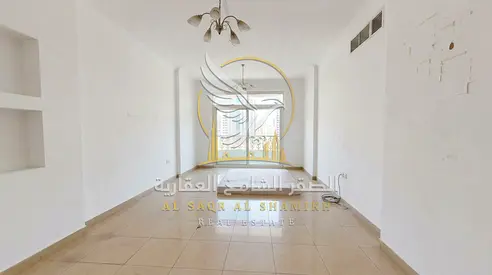 One bedroom apartment with living room for annual rent in Al Majra balcony with open view master be