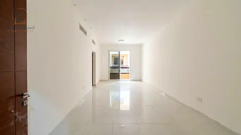 Two-bedroom apartment for annual rent in Al Tallah, first occupancy, near Dubai and Sharjah exits.