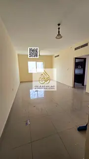 Two-bedroom apartment with a living room for annual rent in Al Rashidiya 3