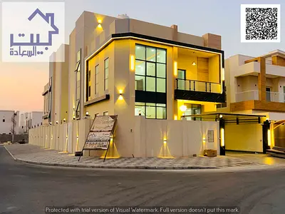 A luxurious villa for sale in Al Yasmeen, Ajman, boasting an exceptional location and high privacy as a corner villa on two streets.