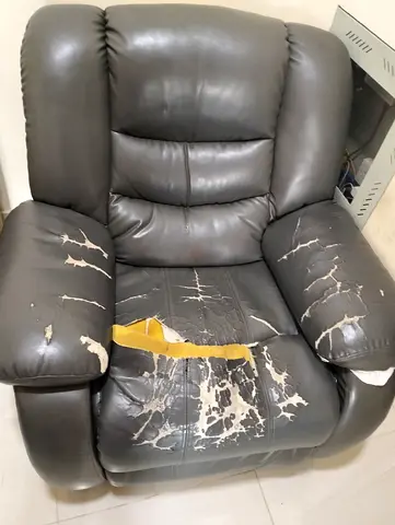 Used grey leather recliner armchair – set for reupholstery / repair