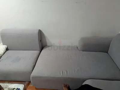 Light grey L-shaped fabric sofa - good condition