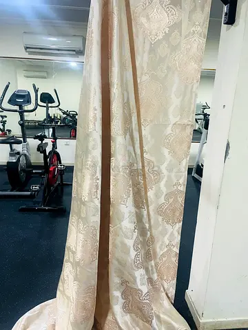 Beige patterned full-length curtain panel - gently used