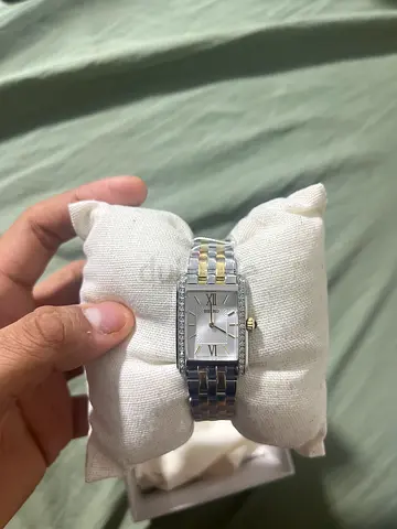 Two-tone rectangular women's wristwatch with crystal accents - good condition