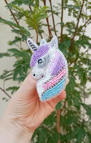 Handmade beaded embroidery unicorn brooch — pastel colors