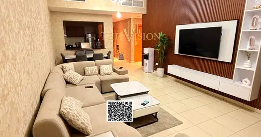 Two bedrooms and a living room, spacious, with a down payment of 250,000 AED and parking.