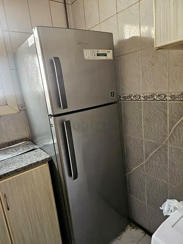 Used double-door refrigerator (top freezer) - good working condition