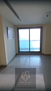 For annual rent | Two bedrooms and a living room | First row from the Corniche | Open sea view | 3 b