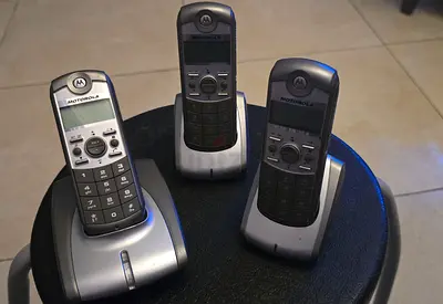Motorola cordless phone set - 3 handsets with base, with charging cables