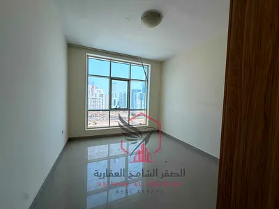اجمل غرفتين وصالة اطلالة مفتوحة بباركن وشهر مجانا ومطبخ امريكي في أجمل أبراج الشارقة شامل جميع الخدمات بتشطيب حديثة