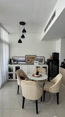 Small round dining table with 4 upholstered chairs