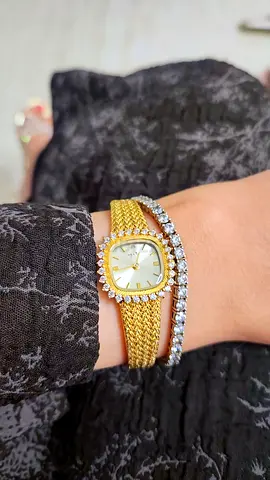 Gold-tone women’s bracelet watch with crystal bangle