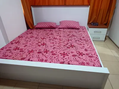 White double bed frame, 2 bedside tables , five door cupboard, dressing table