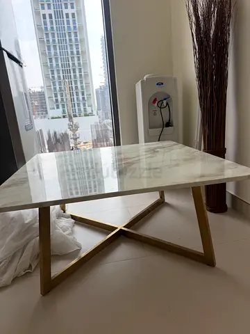 Marble-top coffee table with gold metal legs — good condition