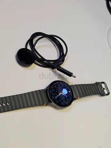 Samsung Galaxy Watch7 with charger