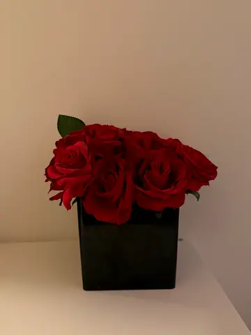 Artificial red rose arrangement in black square vase - Hand made in Florence and imported.