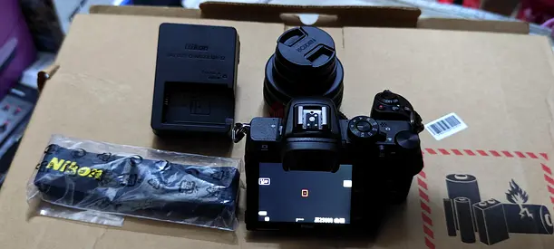 Nikon z50 mirrorless camera with extra lens, charger and strap