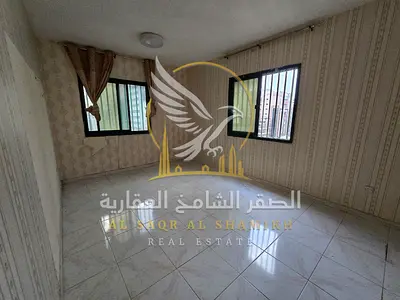 Two Bedroom Hall Apartment for Annual Rent in Al Qasimia Al Mahatta Two Spacious Bedrooms Providing