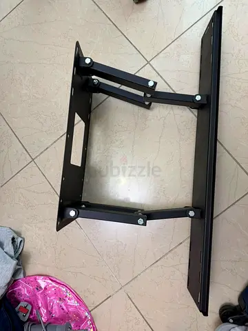 Adjustable full-motion TV wall mount bracket - good condition