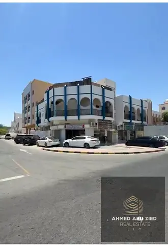 بناية استثمارية للبيع في النعيمية 2 بعجمان على شارع عدي بن حاتم، 5 شقق و4 محلات، دخل سنوي 150 ألف درهم، بسعر 2.5 مليون درهم