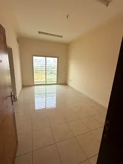 Two-bedroom apartment with a living room for rent in Al Rashidiya 2.