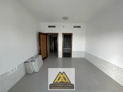 Prime High-Rise Living: Luxury 1BHK Apartment with 2 Balconies & Master Suite in Al Jurf 2, Ajman