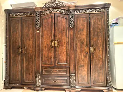 Large Ornate Wooden 4-Door Wardrobe with Carved Details