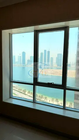 For sale: a two-bedroom apartment with a living room in Riviera Tower, Sharjah. A great opportunity