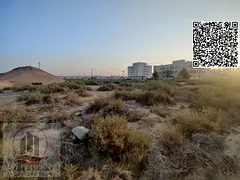 For Sale in Al Yasmeen Area | Residential/Commercial Land for Buildings on a Main Street Directly Op