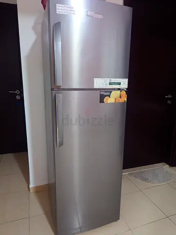 Very good condition two-door refrigerator, stainless steel finish