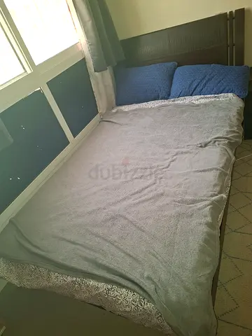 Double wooden bed