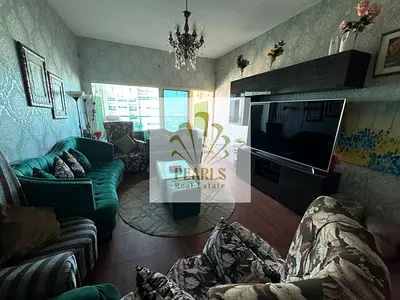Luxury furnished 3-master-bedroom apartment with 5 bathrooms and sea views in Al Rashidiya 3, with easy access to Sharjah and Dubai.