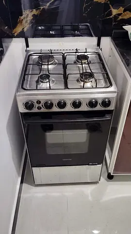 Used freestanding 4-burner gas stove with oven - good working condition
