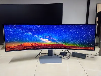 The Samsung Odyssey OLED G9 (G91SD) is a massive 49-inch ultrawide curved gaming monitor that featur