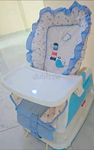 كرسي هزاز و طعام معا"